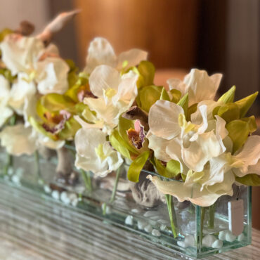 Casa Moderna with White Vandas and Green Cymbidiums