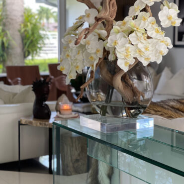 16″ Moon vase with white orchids