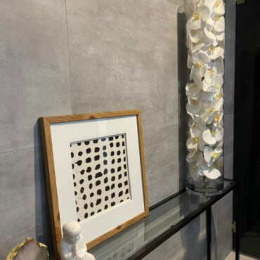 Glass Cylinder With White Phalaenopsis Orchids