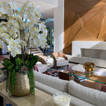 Delaney Gold Pot with Multiple Stems of Phalaenopsis Orchids and Succulents