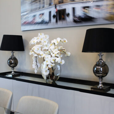 16″ Moon vase with white orchids
