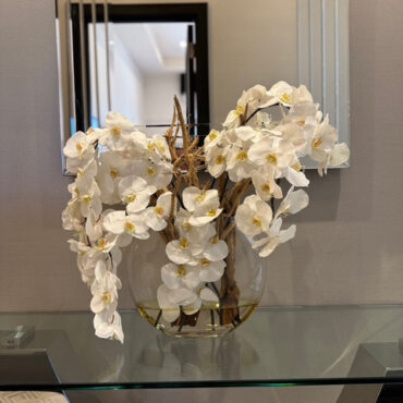 16″ Moon vase with white orchids