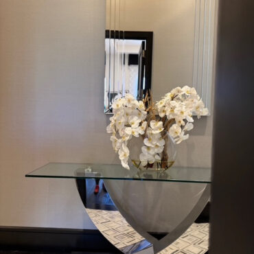 16″ Moon vase with white orchids