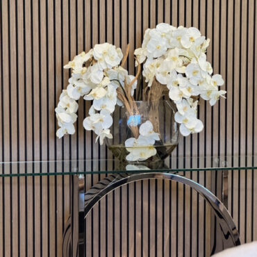 16″ Moon vase with white orchids