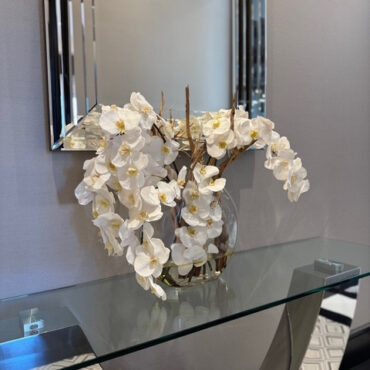16″ Moon vase with white orchids